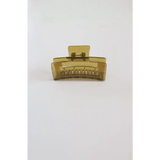 Translucent yellow medium size hair clip with ridged teeth, a favorite go-to hair accessory