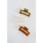 Two plastic hair clips in olive green and brown, perfect medium size for your favorite go-to hair