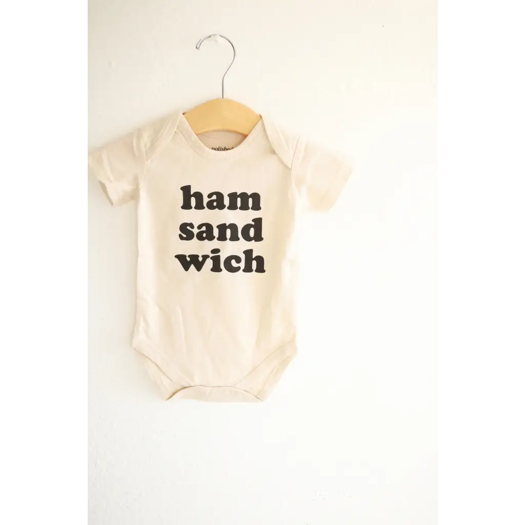 Cute infant bodysuit with ham sandwich text made from organic cotton, fits 3-month-olds closer
