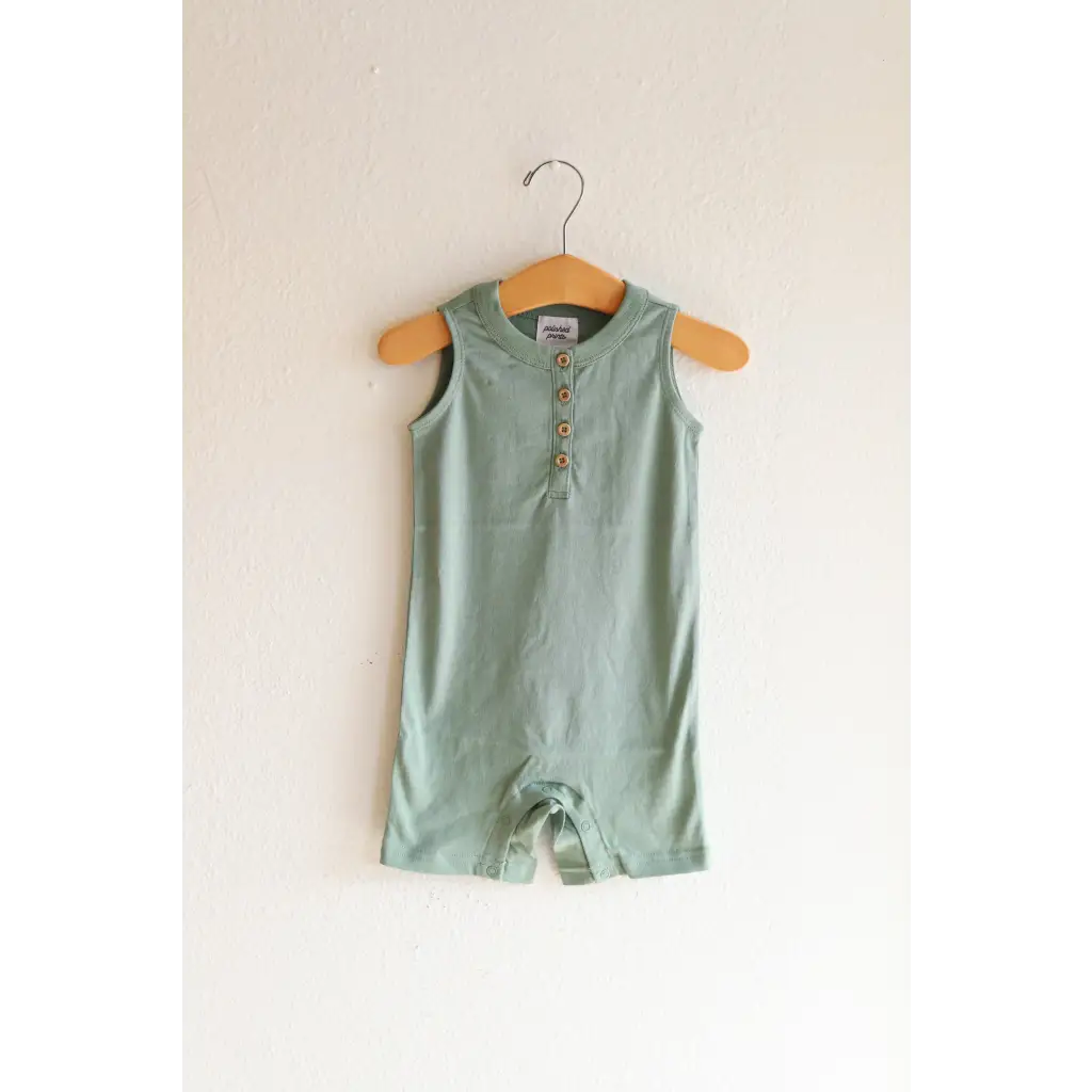 Sleeveless sage green henley romper with buttons, made from super soft organic cotton