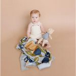 White cotton overalls with a floral blanket and stuffed toy perfect for Henry Bear loves spending time