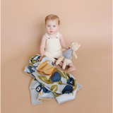 White cotton overalls with a floral blanket and stuffed toy perfect for Henry Bear loves spending time