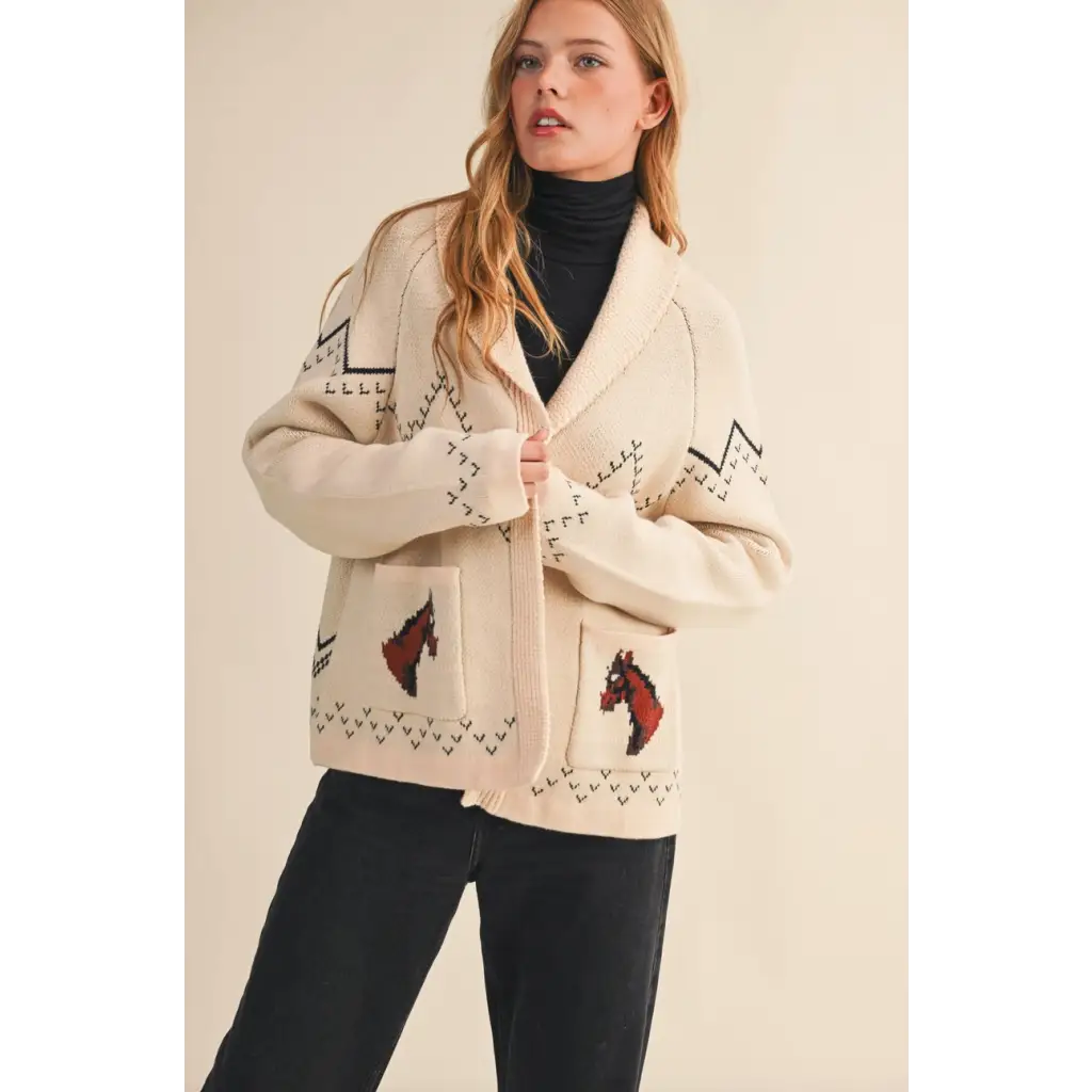 Cream-colored Holly Horse Knit Sweater Cardigan with black geometric patterns and red horse motifs