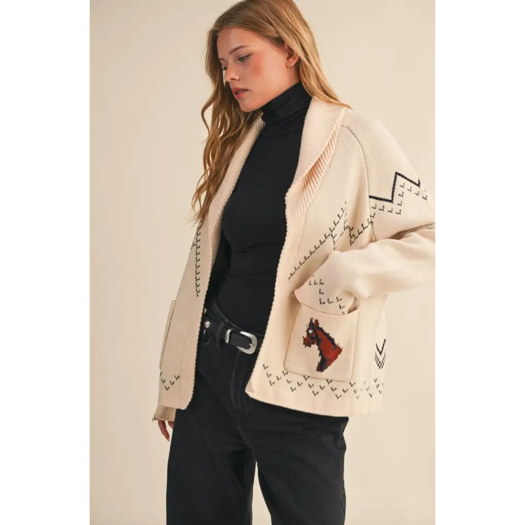 Cream-colored Holly Horse Knit Sweater Cardigan with black geometric pattern and red horse motif