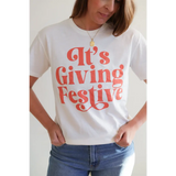 Giving Festive Unisex T-shirt with Coral Text showcasing a fun festive style