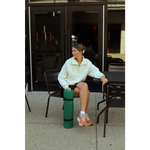 Green cylindrical bollard for styling your Kate Fleece Pullover in every gal’s wardrobe