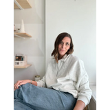Casual look of someone in a Kate Fleece Pullover and blue jeans, perfect for every gal’s wardrobe