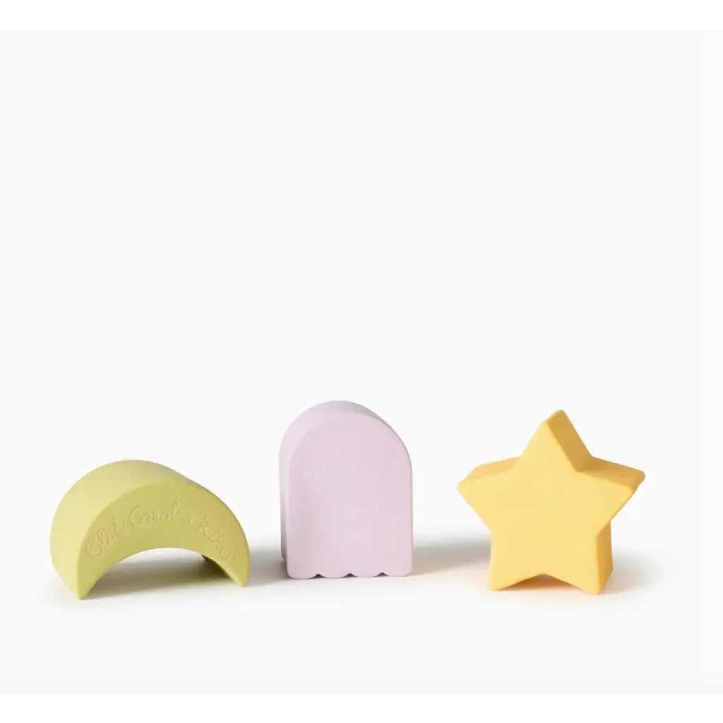 Three pastel wooden geometric figures in a Floating Stacking Blocks Set made of natural rubber