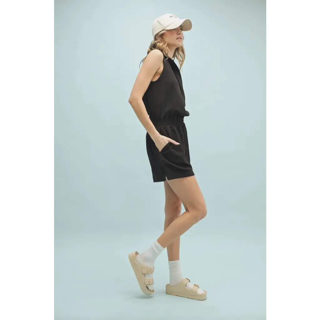Black sleeveless romper with elastic waist and polished prints from Lexie Athletic Collared Romper