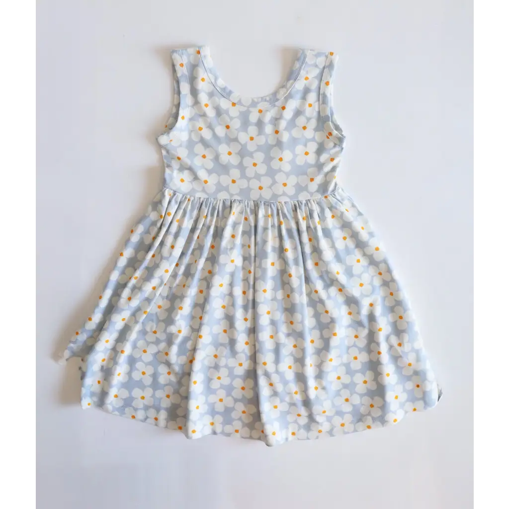 Light blue Libby Twirl Dress with a cute daisy floral print for fun adventures