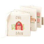 Cream-colored fabric blocks with embroidered farm scenes from Little Farm Soft Book