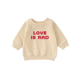 Beige baby pullover sweatshirt in organic cotton fabric with red Love Is Rad text