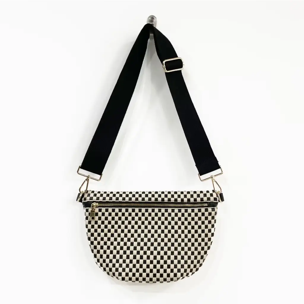 Lucy Woven Sling Bag made of vegan leather with checkered design and adjustable wide strap