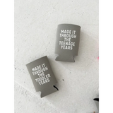 Two gray koozies with funny sayings about surviving the toddler years from Polished Prints