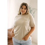 Beige Organic Cotton Tee with light embroidery paired with blue jeans for stylish womens clothes