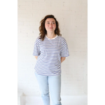 Woman in stylish womens clothes wearing Mary Striped Short Sleeve with polished prints