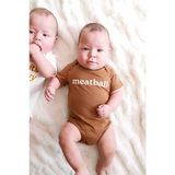 Two babies on white fabric, one in a Meatball Organic Cotton Baby Onesie