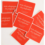 Red business cards with playful sticker inspiring fun vibes and less judgement for parties