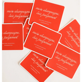 Red business cards with playful sticker inspiring fun vibes and less judgement for parties