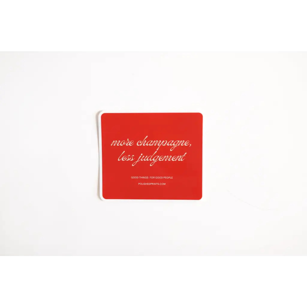 Playful sticker featuring red coaster that says more champagne less judgement for fun vibes