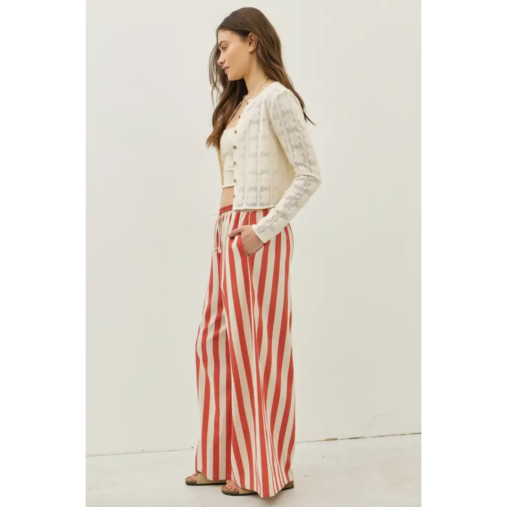 Woman wearing Morocco Stripe Wide-Leg Pants with elastic waistband and polished prints