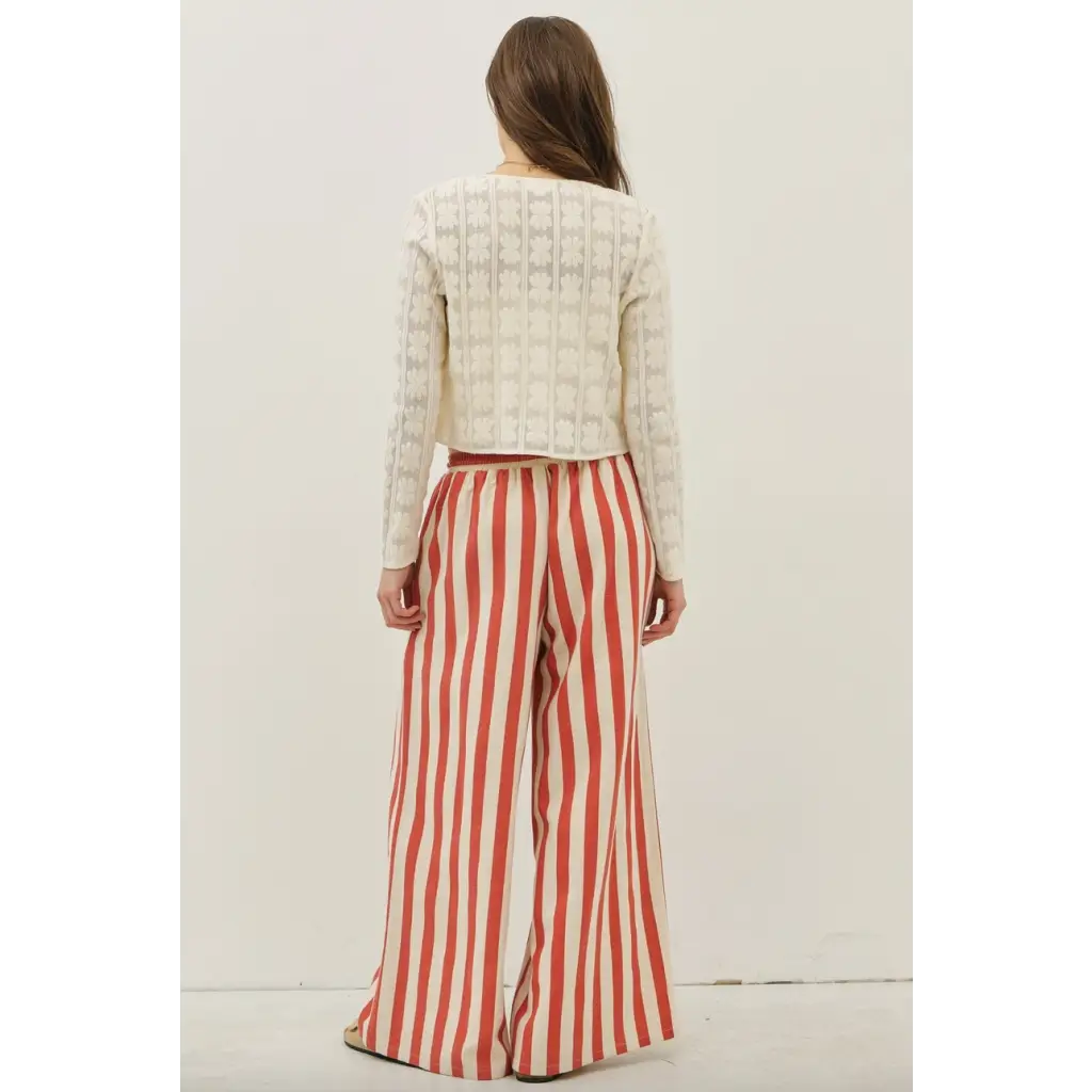 Woman in cozy white knit sweater and Morocco Stripe Wide-Leg Pants with elastic waistband