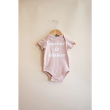 Pink Mover & Shaker Organic Cotton Baby Bodysuit in Peach for trendy little ones