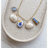 Gold chain necklace with clay charms and shell accents in No. 1 By the Ocean product