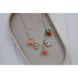 Gold chain necklace with five fruity clay charms, perfect seaside charm necklace style