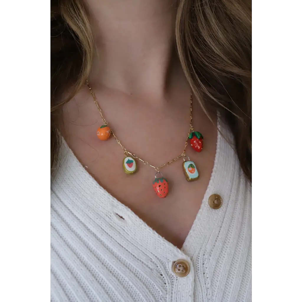 Gold chain necklace with colorful fruit and jam jar clay charms on Seaside Charm Necklace