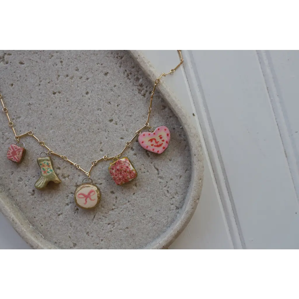 Gold chain necklace with colorful clay seaside charms on Pretty in Pink product page