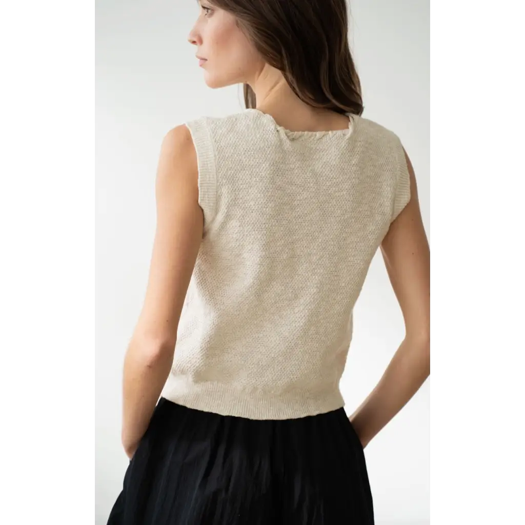 Sleeveless knit vest with V-neck and neck strap, perfect for stylish womens clothes