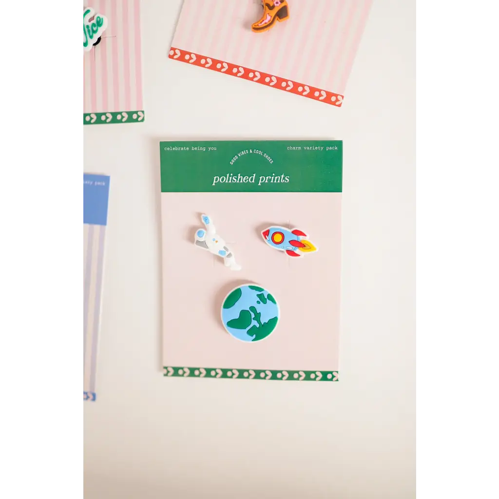 Fun 3-piece outer space charm set with rocket, planet, and unicorn enamel pins