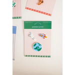 Fun 3-piece outer space charm set with rocket, planet, and unicorn enamel pins