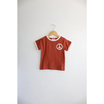 Rust Peace Embroidered Ringer Tee for Kids on hanger, a stylish everyday ringer option