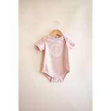 Pink Peace Floral Organic Cotton Baby Onesie with cute panda design on hanger