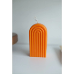 Orange arch-shaped candle with grooves for a fun Petite Rainbow Candle vibe