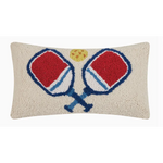 Decorative throw pillow showcases two crossed pickleball paddles in red and blue