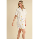 White collared mini dress with colorful fruit and drink embroidery for a fun picnic look