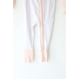 Pink striped bamboo baby sleeper with footed design and zipper for comfy naps