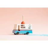 Toy delivery truck in blue and white with Bob’s Rescue text on Bob’s Plumbing Van in solid beech wood
