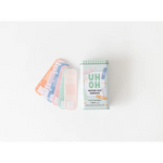 Pastel-colored felt bandages and a first aid packet for fun pretend play adventures