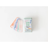 Pastel-colored felt bandages and a first aid packet for fun pretend play adventures