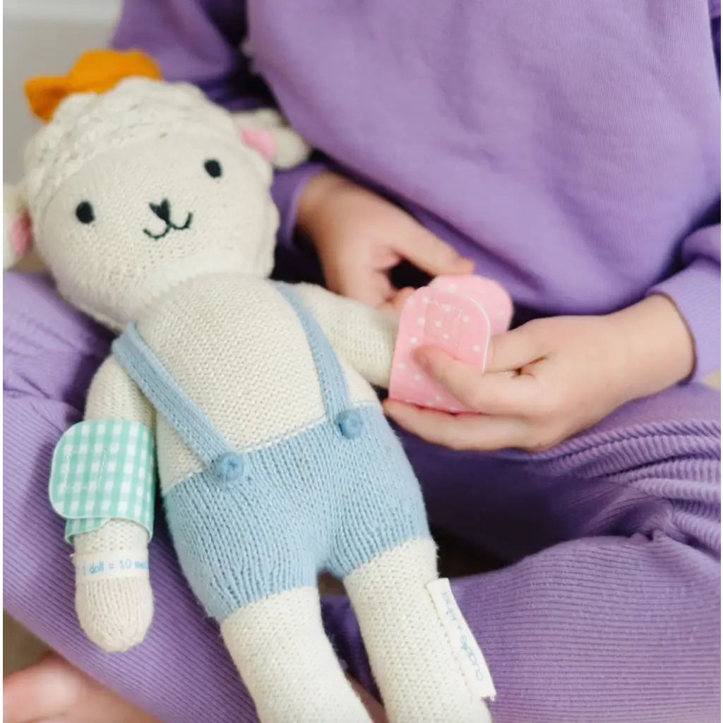 White plush teddy bear in blue overalls for pretend play with Mint Green Felt Bandages