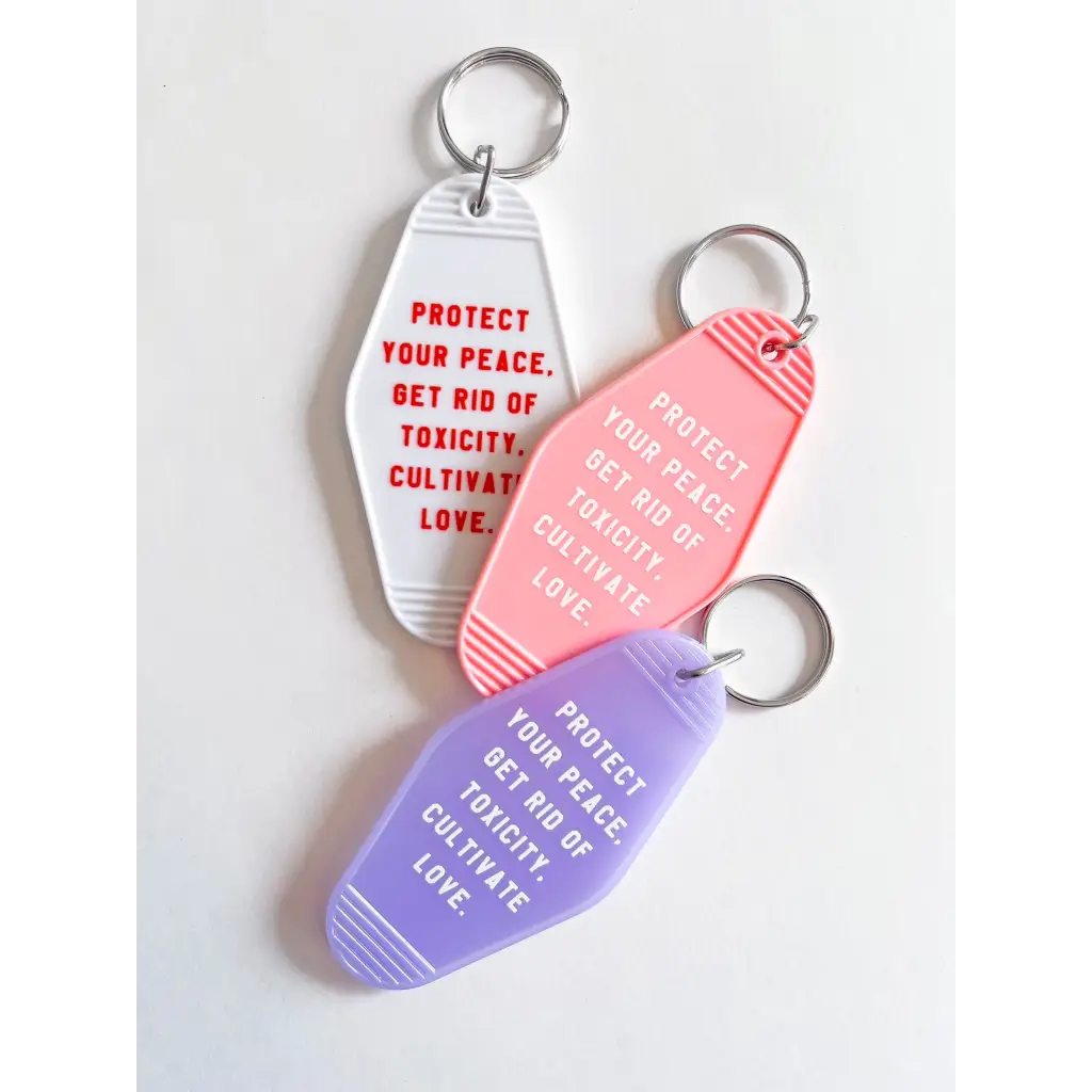 Colorful acrylic retro motel keychains with inspirational text for your vibes