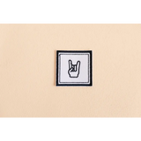 Playful Rock iron-on patch featuring a fun rock-and-roll devil horns hand gesture icon