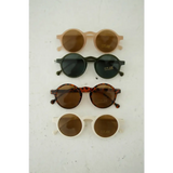 Four pairs of adorable round sunglasses in stylish brown and black tones for kids