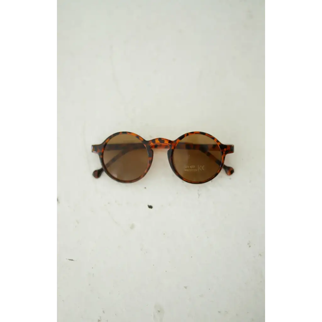 Adorable round sunglasses for kids with brown lenses for fun summer days