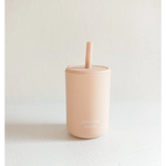 Peachy-pink mini silicone straw cup perfect for little hands to sip in style