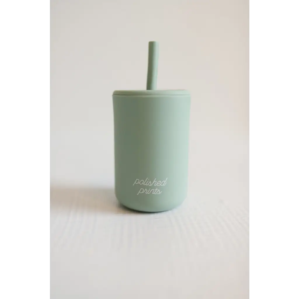 Mint green silicone tumbler with straw from Pastel Mini Silicone Straw Cups for Little Hands